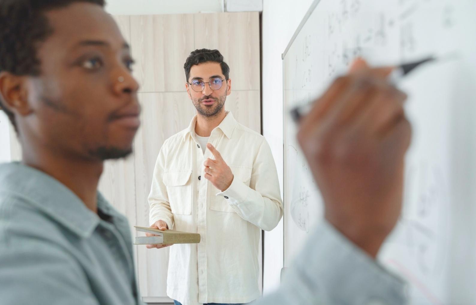 Professional business consultation meeting with financial documents and analysis tools